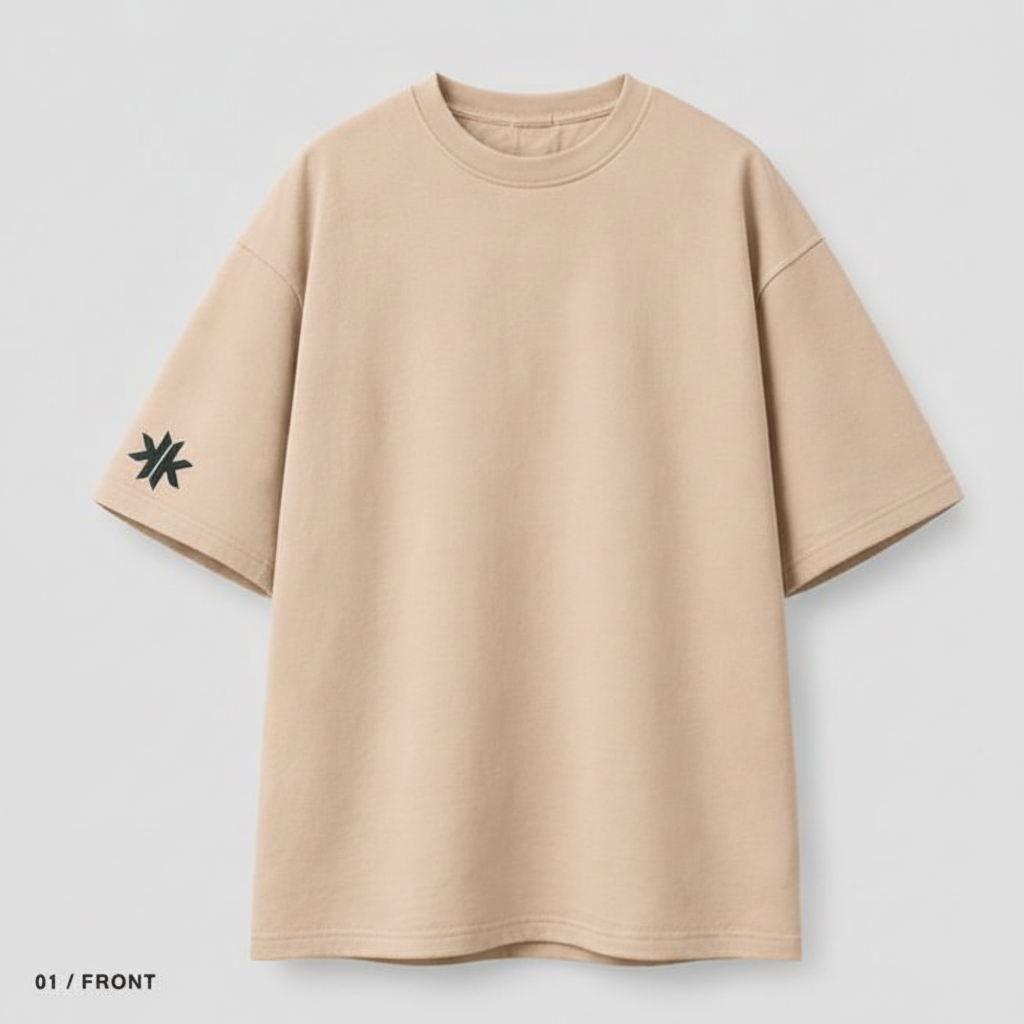 01 / Front – clean beige tee with KK sleeve logo